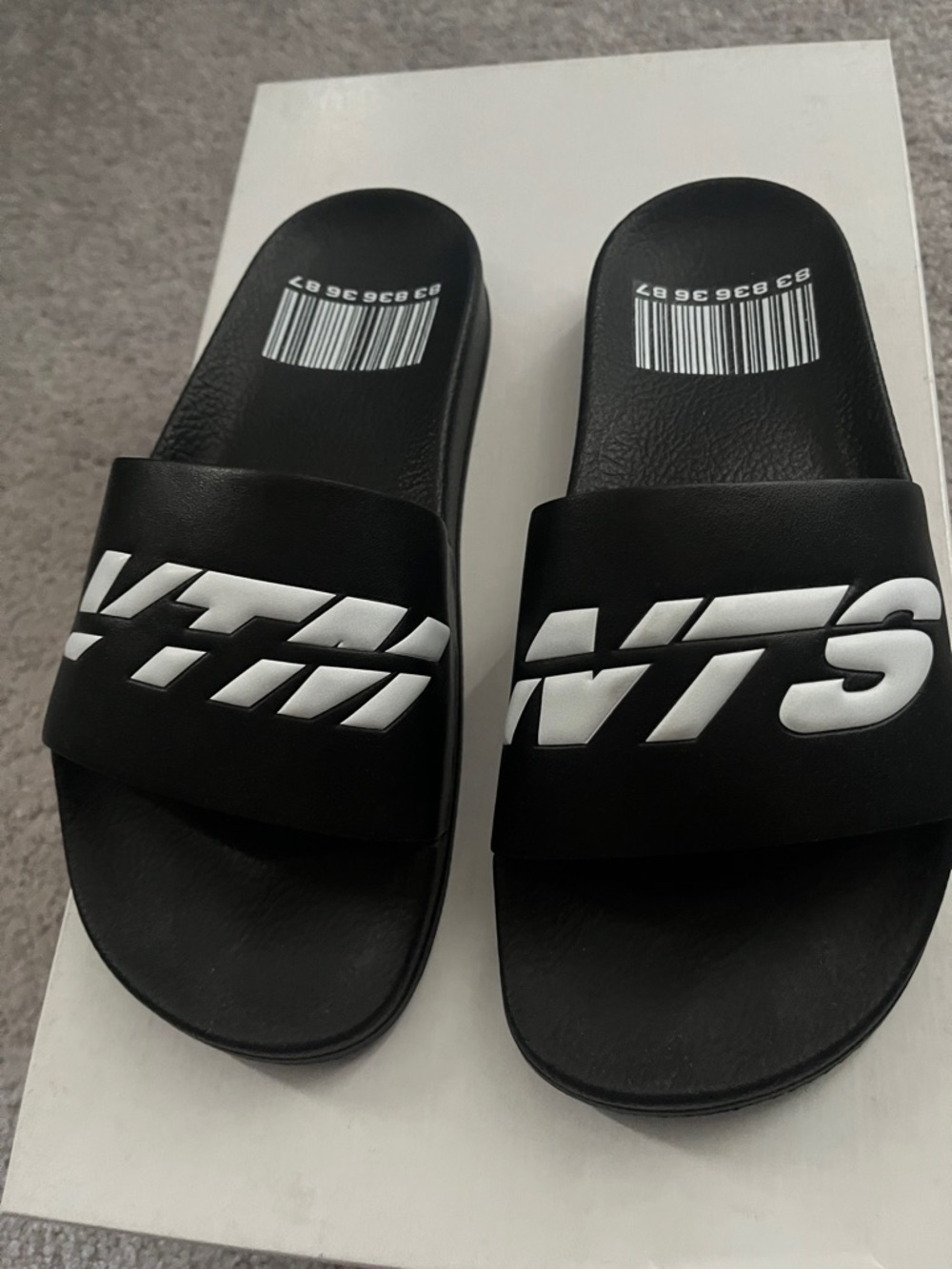 Black Slide Sandals with White Graphic Logo